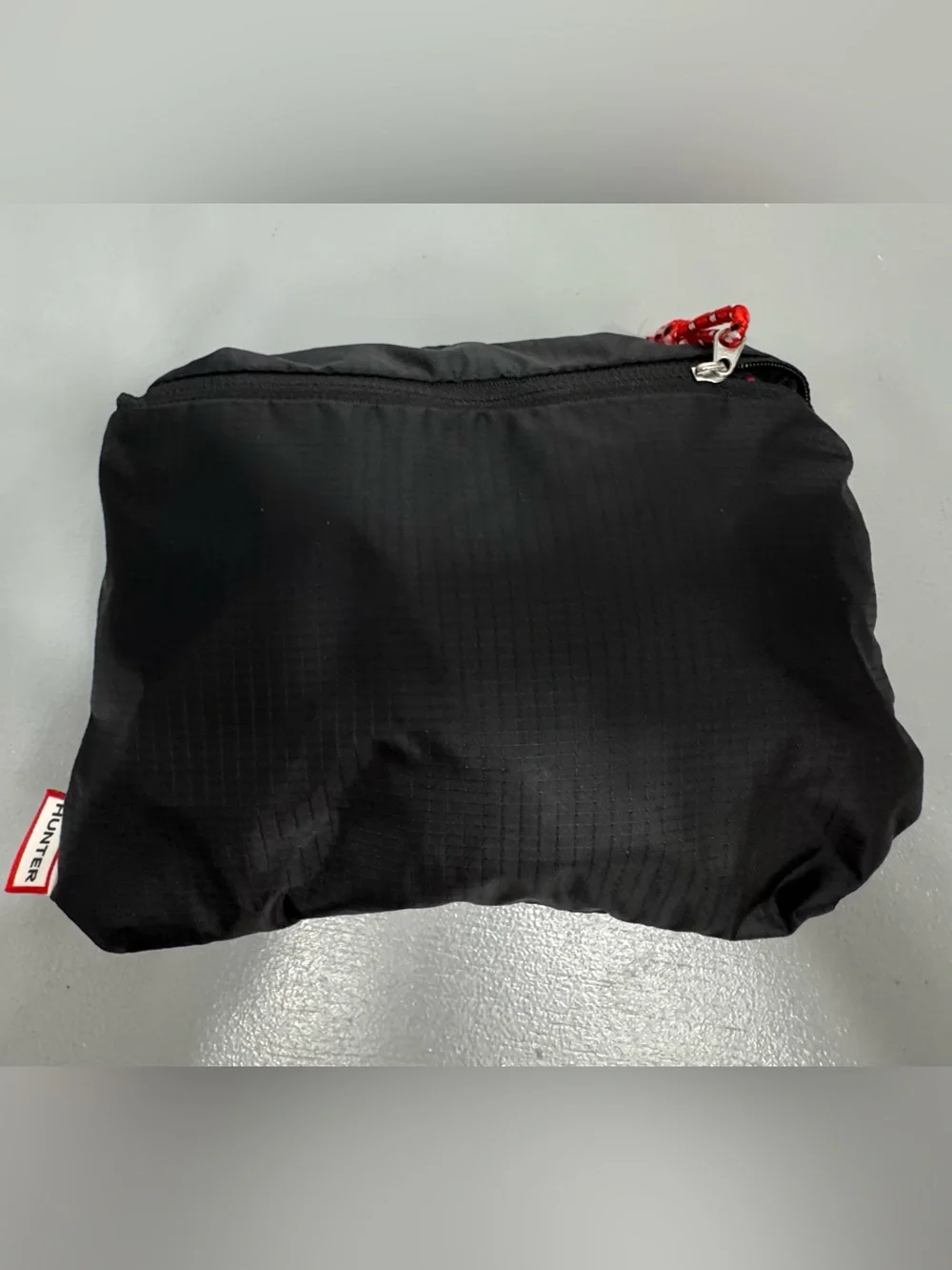 Hunter Black Backpack folds into Pouch